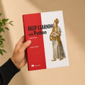 Person holding Deep Learning with Python, Second Edition by Francois Chollet – Manning paperback in hand